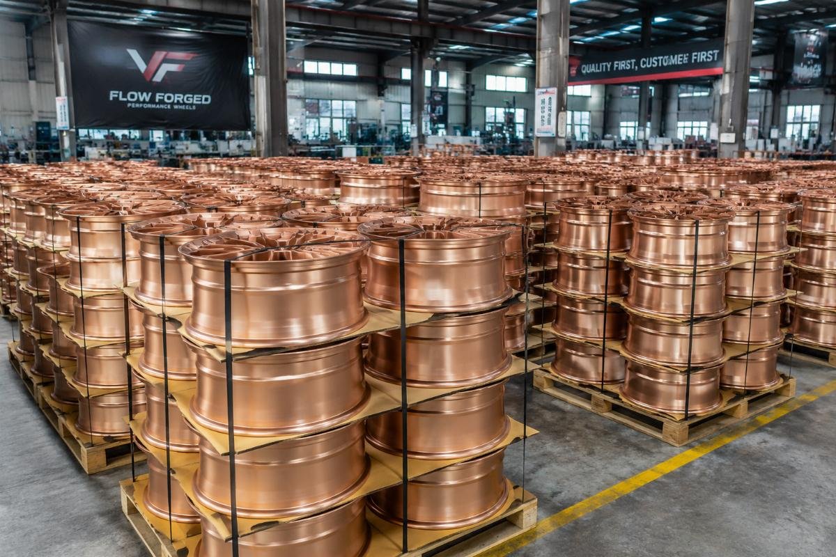 bulk rose gold wheels production Stacked sets of rose gold wheels in a factory warehouse ready for shipping